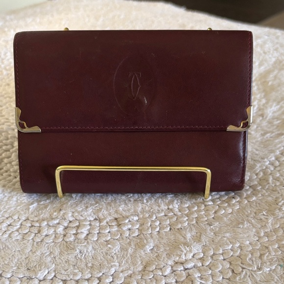 Cartier Handbags - Cartier Burgundy Leather Wallet
